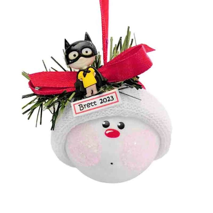 A dynamic Superhero Christmas Ornament featuring a black cape and mask design with a Super Hero emblem on top. Perfect for fans of the caped crusader. Ideal for adding a heroic touch to your holiday decor.